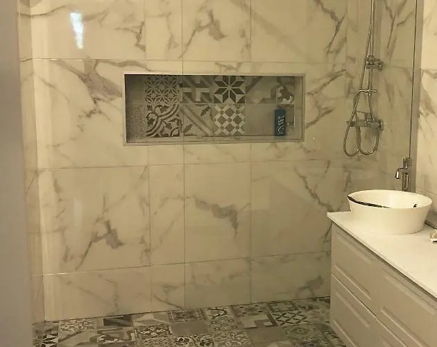 Апартаменты Aman *